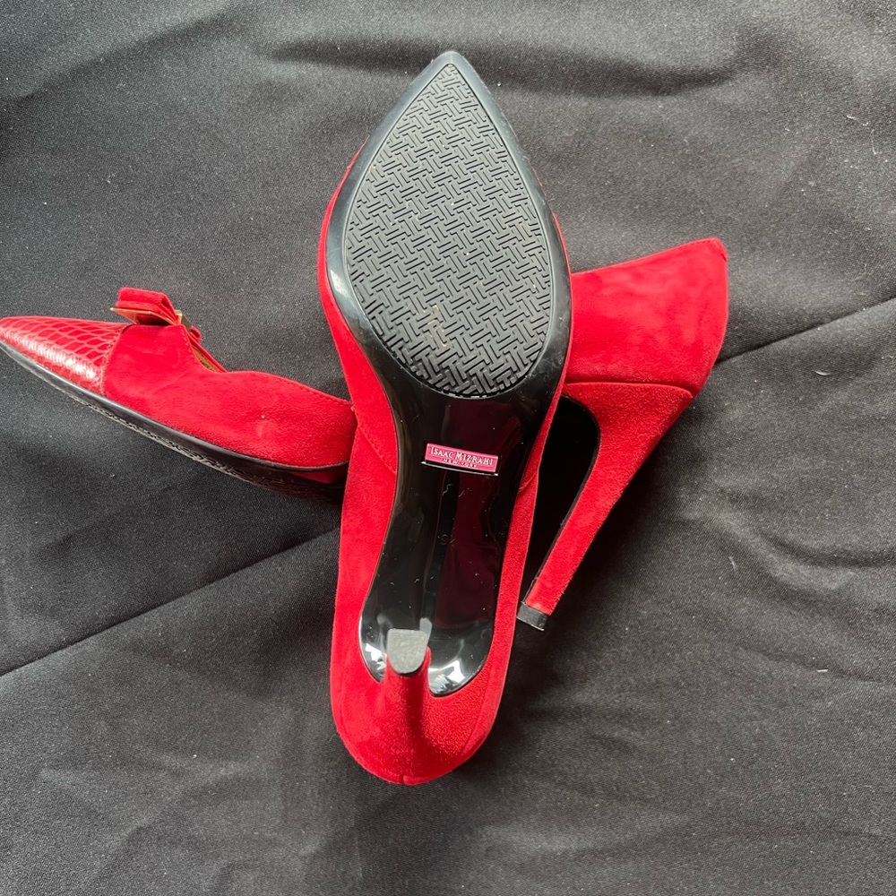Red high heels lady’s shoe.